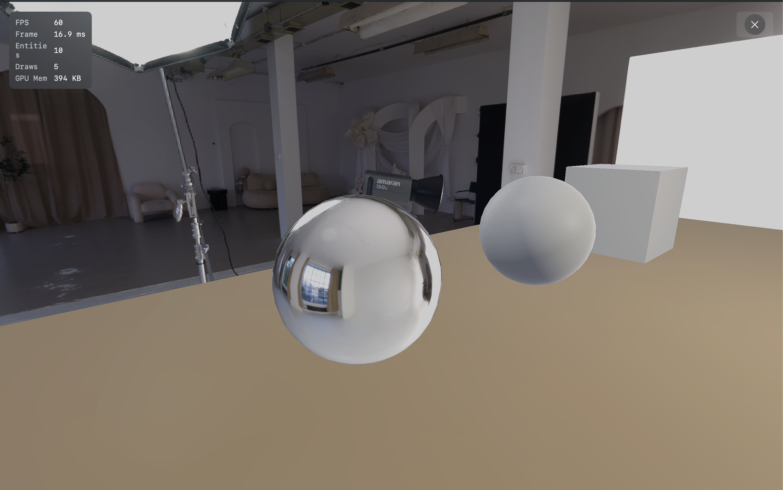 Chrome reference sphere reflecting the studio HDR environment, rendered in real time with split-sum IBL and screen-space reflections.